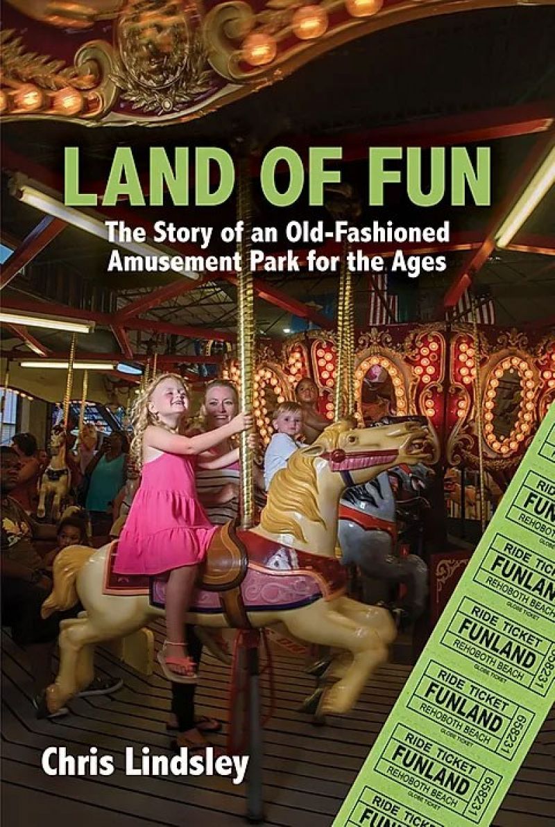 Cover of land of Fun featuring a merry-go-round with a young girl on a horse in the foreground and her younger brother behind