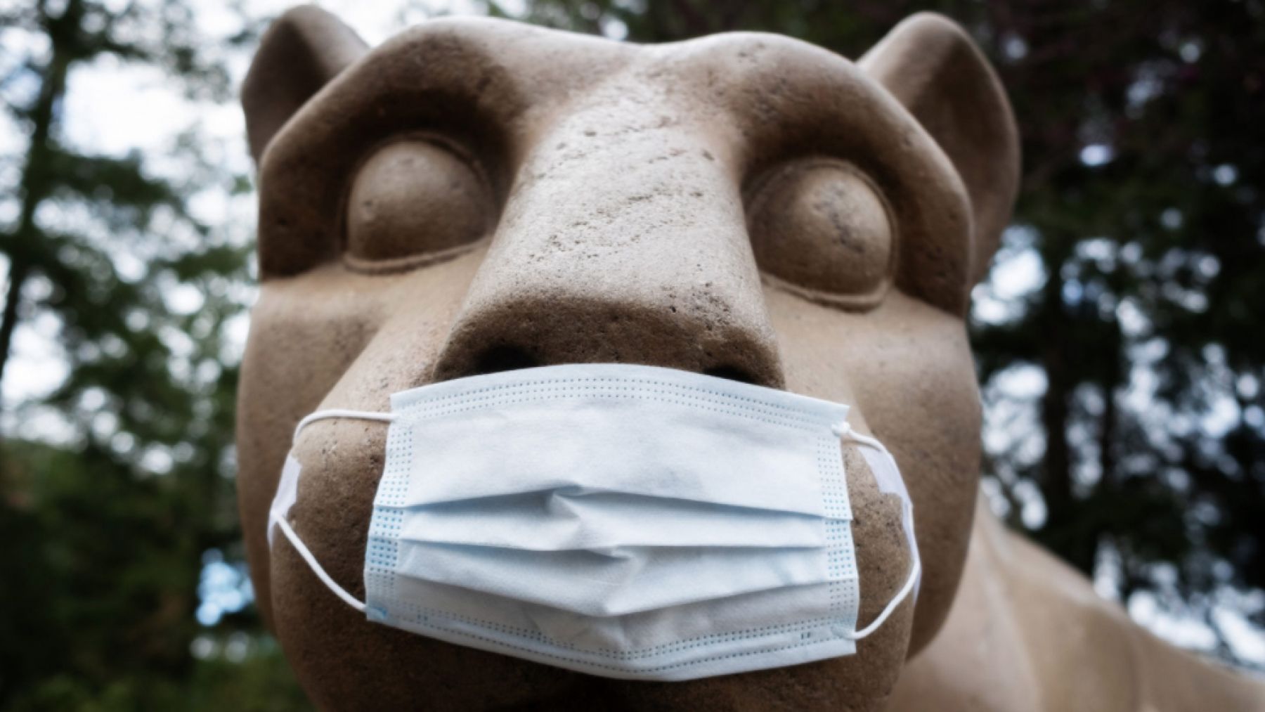 Nittany Lion shrine with a medical mask
