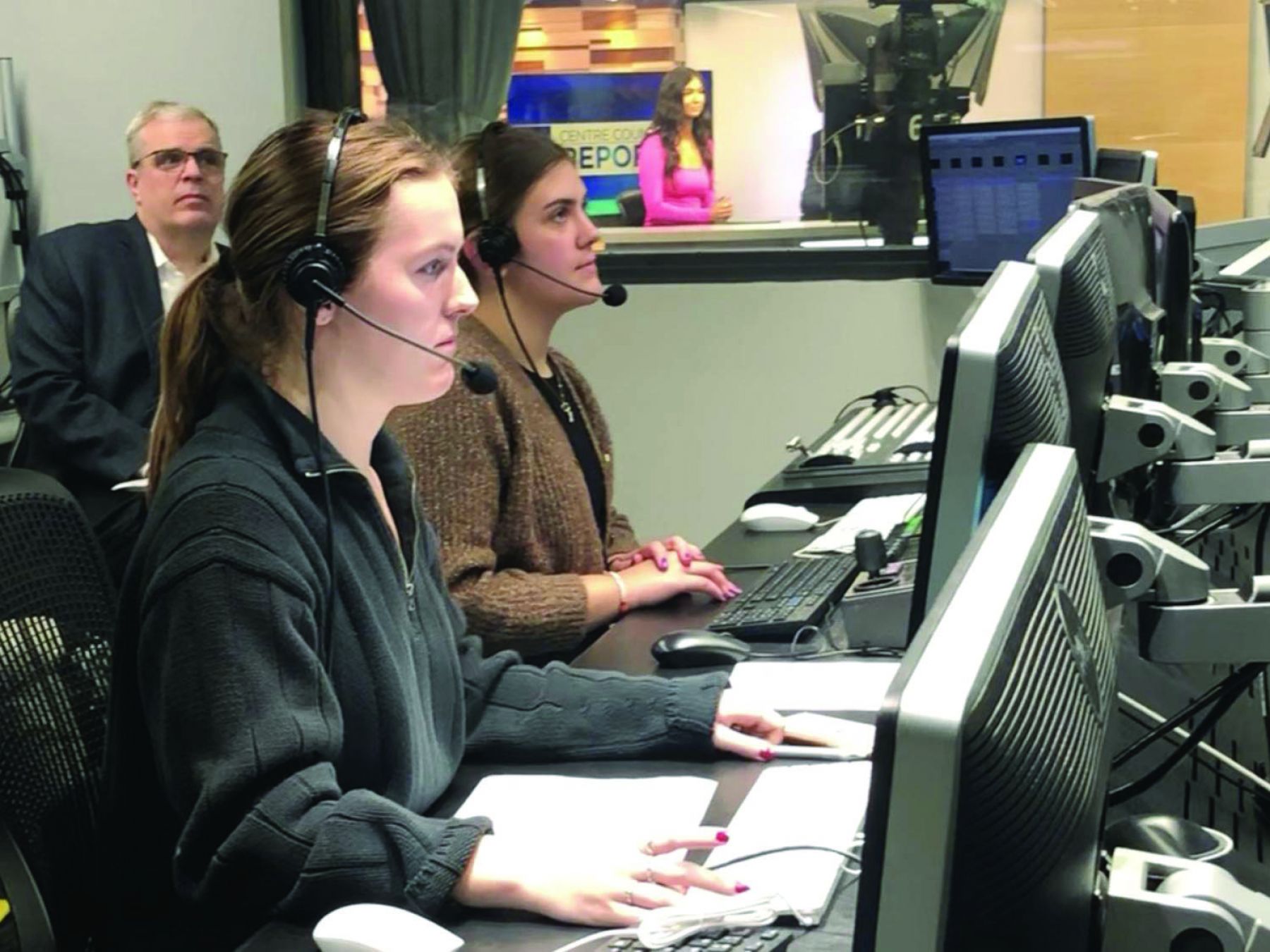 Two students in a production room