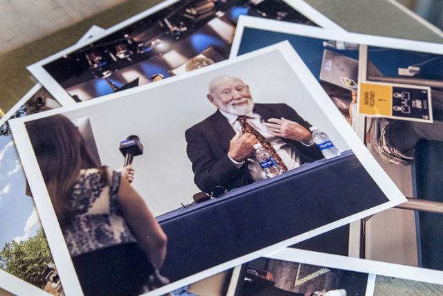 Among the photos in the time capsule are one of Donald P. Bellisario when he visited Penn State to make his transformational gift to the University that made the Bellisario Media Center possible. (Photo by Patrick Mansell)
